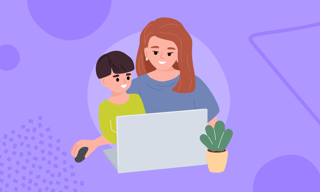 Mama z dzieckiem korzystają z laptopa